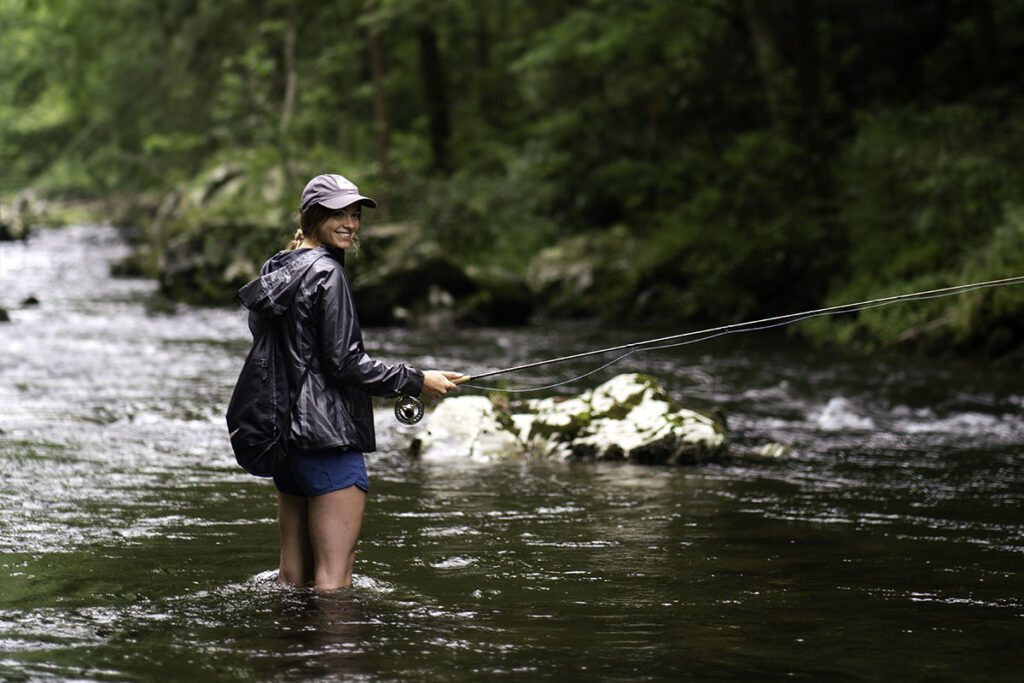Fisherwoman in creek